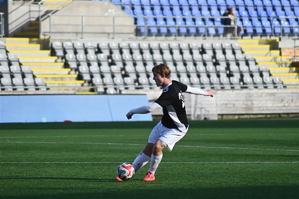 Alastair Banwell playing football